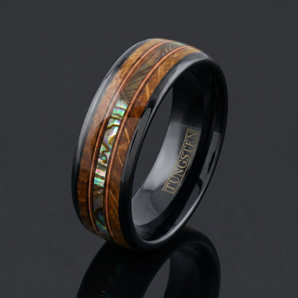 Angel Oak men's black tungsten ring with whiskey barrel oak, abalone and guitar string inlay – angled view