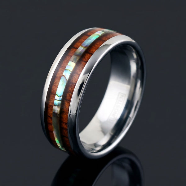 Astraeus men's silver tungsten ring with koa wood, abalone and shell inlay – angled view