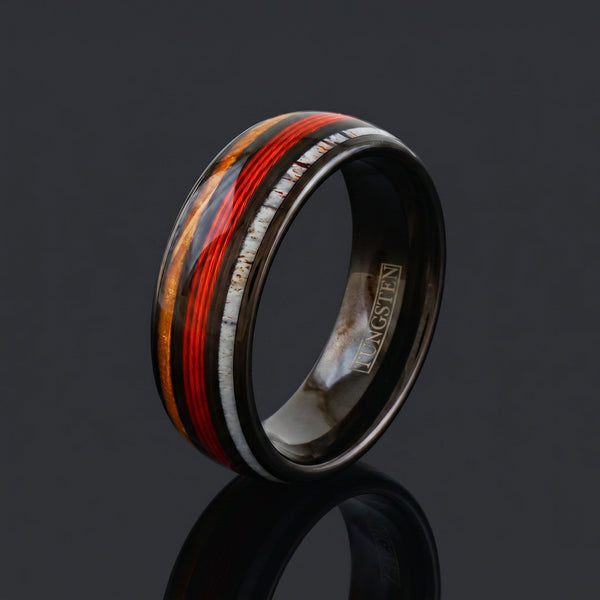 Hades men's black tungsten ring with whiskey barrel oak, deer antler and fishing line inlay – angled view