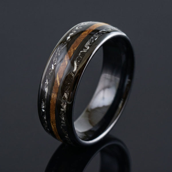 Minerva men's black tungsten ring with meteorite and whiskey barrel oak inlay – angled view